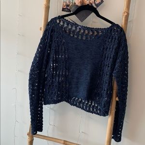 Holed blue sweater